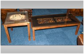 Two Contemporary Glass Topped Coffee Tables with decoration to surfaces. One depicting fighting