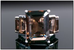 Smoky Quartz Graduated Octagon Cut Ring, the large, prong set, central, octagon cut smoky quartz