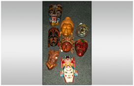 Collection Of 8 Various Decorative Carved Tribal Masks