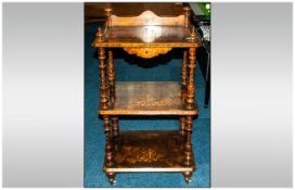 Walnut Three Tier Whatnot, with turned supports and various inlay decoration.