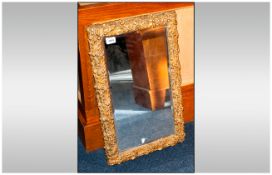 Molded Gilt Framed Bevelled Edge Mirror, rectangular in shape with  Acorn and Leaf design frame.