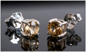 Canary Aquamarine Solitaire Stud Earrings, round cuts of the unusual yellow variety of aquamarine,