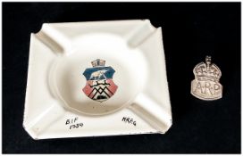 1939 Tin Ashtray together with ARP Silver Badge.