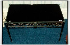Black Glass Pop Art Coffee Table with black coloured glass top and shaped metal legs and fretwork