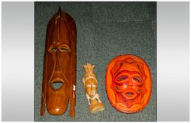 Carved Tribal Mask, African Carved Wall hanging and African Woman Statue.