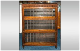 3 Tier Wernicke Type Oak Bookcase with Lift up Doors Fully Leaded. The Top Rail of The Cabinet