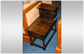 Reproduction Oak Hall Table in the Jacobean Style. With a lift up lid compartment and with a