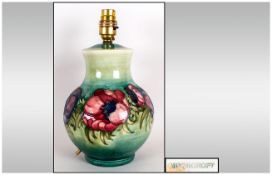 Moorcroft Globular Shaped Lamp Base ' Clematis ' Design on Green Ground. Stands 10.5 Inches HIgh.