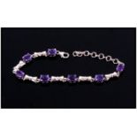 Amethyst Ovals and Bows Bracelet, 8.5cts of oval cut amethysts interspaced with platinum vermeil and