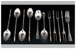 A Late 19th Century 8 Piece Silver Set of Fruit Spoons and Forks. Marked 800. + 2 Spoons and 1 Fork.