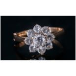 Ladies 9ct Gold Set CZ Cluster Ring with flower head setting. Fully hallmarked. 3.grams. Good