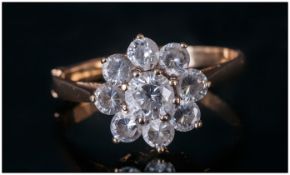 Ladies 9ct Gold Set CZ Cluster Ring with flower head setting. Fully hallmarked. 3.grams. Good
