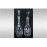 Two Silver Topped Cut Glass Decanters Both With Stoppers. R