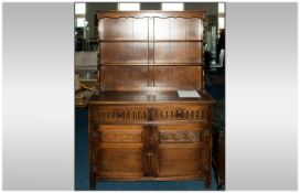 Oak Dresser And Rack, 2 Shelves Above 2 Drawers With Storage Units, Carved Jacobean Style Front.