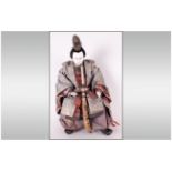 Japanese 19th Century Seated Samurai Warrior Doll Figure. Edo Period. Dressed In Silk Brocade Robe