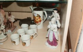 Two Figurines In Chinese Outfits.