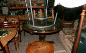 Round Glass Topped Dining Table.