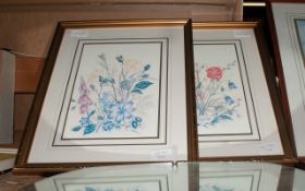 Two Gold Framed Pictures of Flowers.