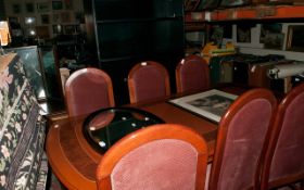 Wooden Table with 6 Hi Back Chairs with Red Cushions.