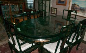 Black Pictured Table With Matching Chairs.