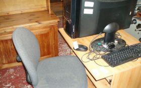 Computer Desk with Chair, Tower, Flat Screen, Keyboard and Mouse.