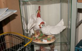 Ceramic Statue of a Hen & Cock.