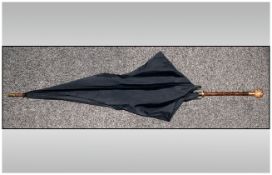 Pinchbeck Victorian Ladies Umbrella with an engraved pommel & bamboo shaft.