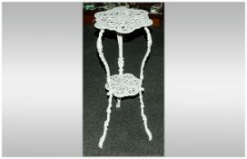 A Victorian Cast Iron 2 Tier Table. 28 Inches High x 14.5 Inches Wide.