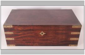 A 19th Century Travelling Walnut Veneered & Brass Mounted Writing Slope with fitted compartments for
