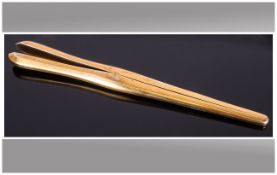 A Good Quality Pair Of Silver Gilt Glove Stretchers, Hallmark London 1949, 8.75'' in length. 94