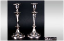 Elkington & Co Pair of Silver Plated Candlesticks. Each with Separate Covers and Circular Stepped