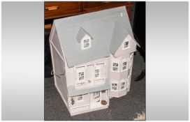 Modern Two Storey Painted Dolls House with untested electrical connection. Together with an