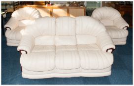 Three Piece Cream Leather Suite comprising 2 armchairs and 3 seater settee.