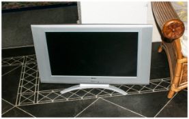 Tevion 27 Inch Flat Screen TV with remote control.
