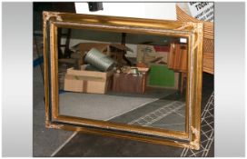 A Gilt Frame Composition Mirror in the Victorian Style 42 by 32 inches.