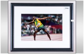 Usain Bolt Signed Photograph, mounted & signed