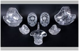 Collection of Cut Glass Flower Baskets (8) in total. Various sizes. All with star cut bases. Of good