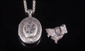 Large Embossed Silver Locket, Floral Engraved Scroll Decoration, Unmarked 55x33mm Including Bale.