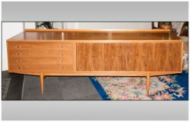 Archie Shine 1960's Danish Style Rosewood And Teak Sideboard with two cupboards and four serrated