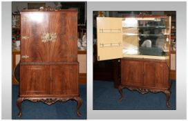 Mahogany Queen Anne Style Cocktail Cabinet with a cupboard top with fine engraved brass hinges and