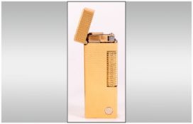 Dunhill Cigarette Lighter Gold Plated Engine Turned Case.