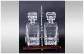 Fine Pair of Quality Cut Glass Decanters, Complete with Silver Plate and Mahogany Stand. Each