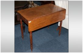 A Late Georgian Mahogany Pembroke Drop Leaf Table with one drawer and a dummy to the other side,