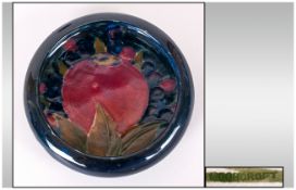 William Moorcroft Small Inverted Dish ' Pomegranates and Berries ' Design on Blue Ground. 4.25