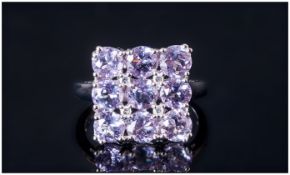 Rose de France Amethyst Chequerboard Ring, nine round cut Rose de France amethysts, a favourite of