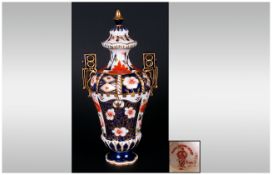 Royal Crown Derby Two Handle Lidded Imari Vase. Date 1902. Stands 7.5 Inches High.