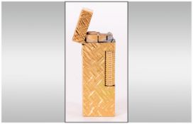 Dunhill - Rollagas 18ct Gold Plated Lighter with Florentine Pattern, Butane Gas Mechanism. c.1980.