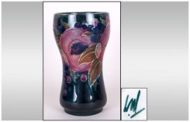 William Moorcroft Goblet Shaped Vase ' Pomegranates and Berries ' Design, on Blue Ground. 1920's/
