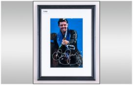 Rory McIlroy Signed Photograph, mounted & signed