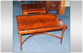 Reproduction Mahogany Nest of Three Tables in the Georgian style with round tapering legs.